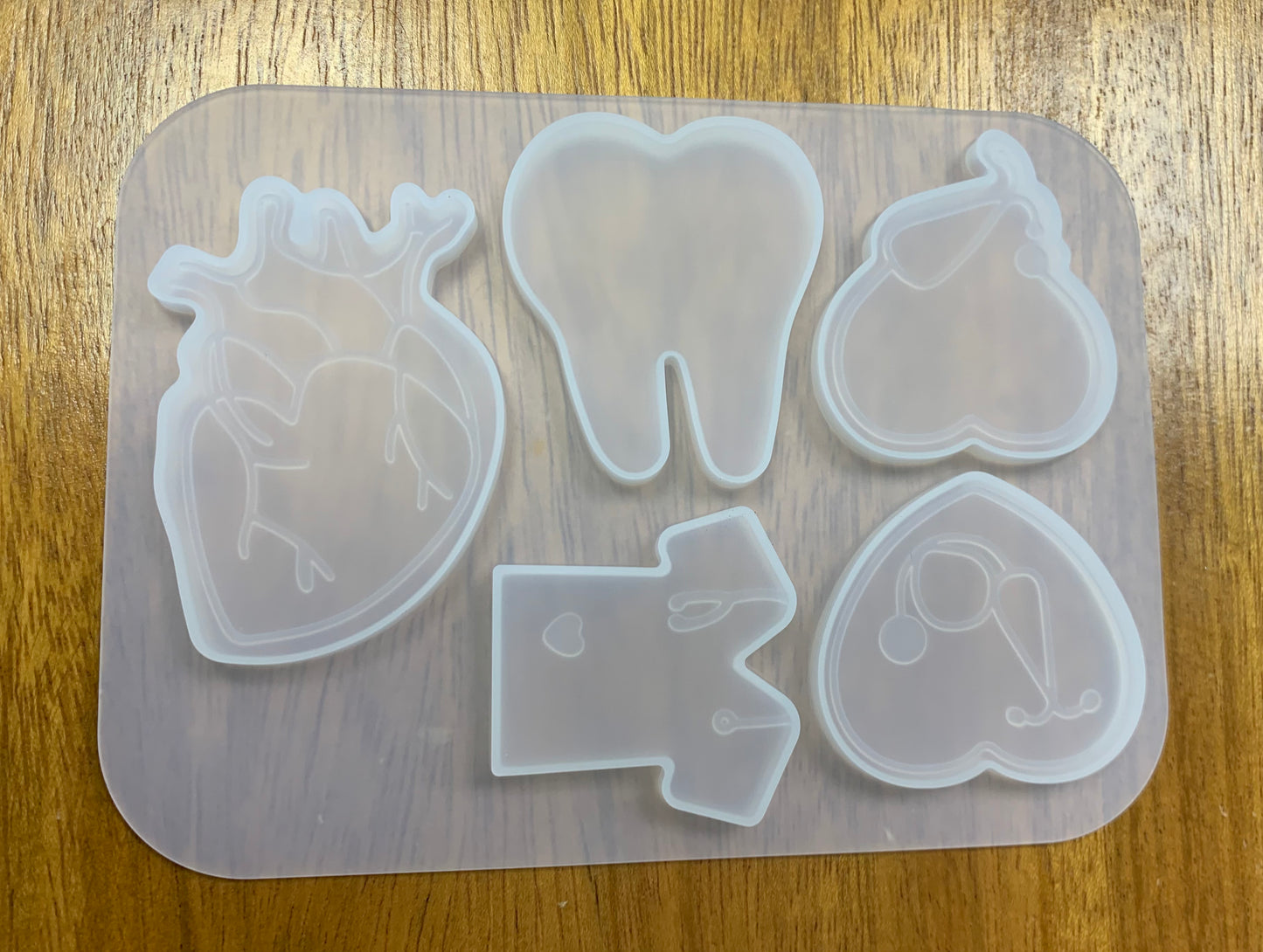 Moldes para llaveros y dijes en forma de medicina, órganos, y posiciones médicas